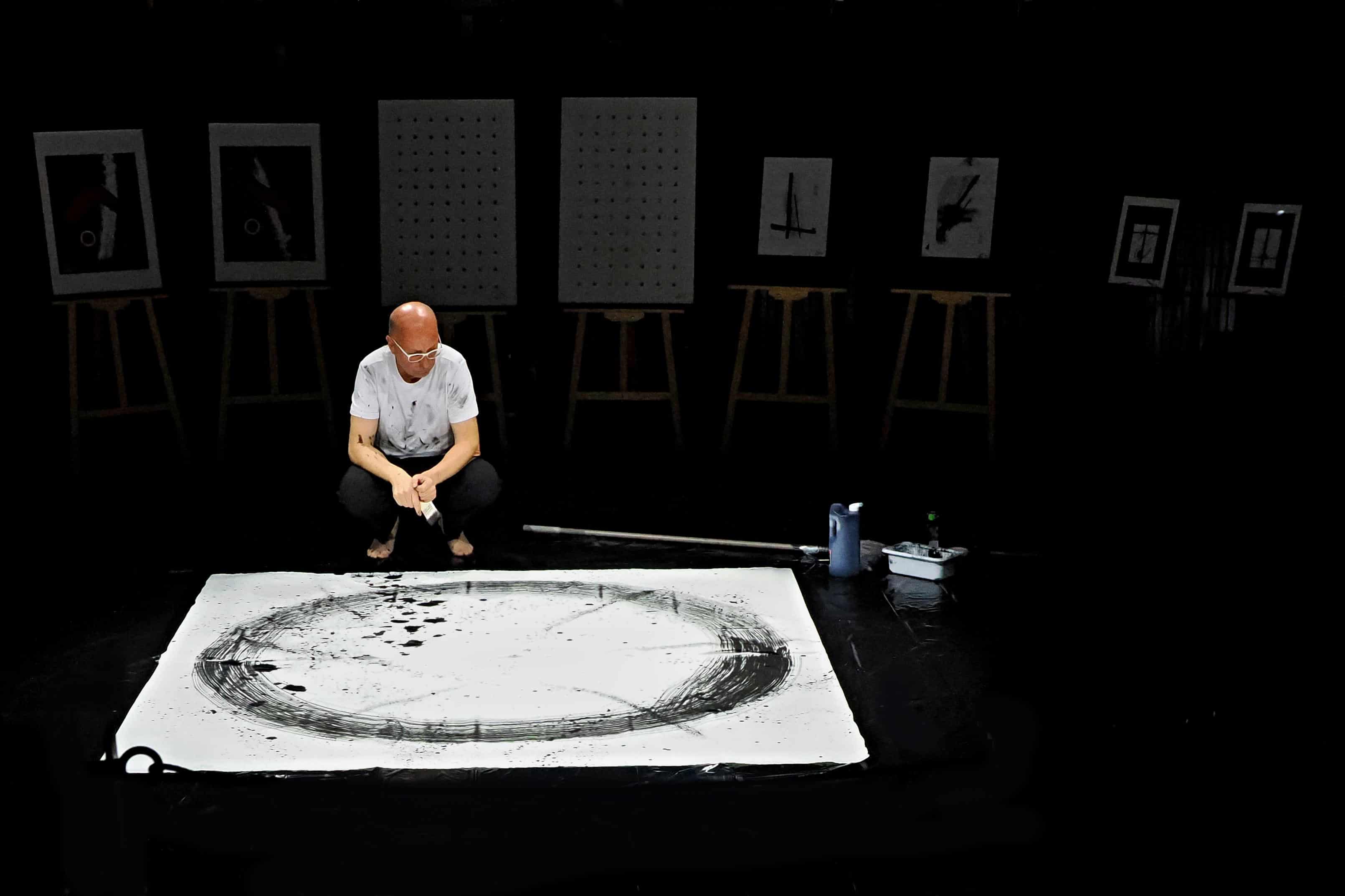 A circle slowly forms in the silence